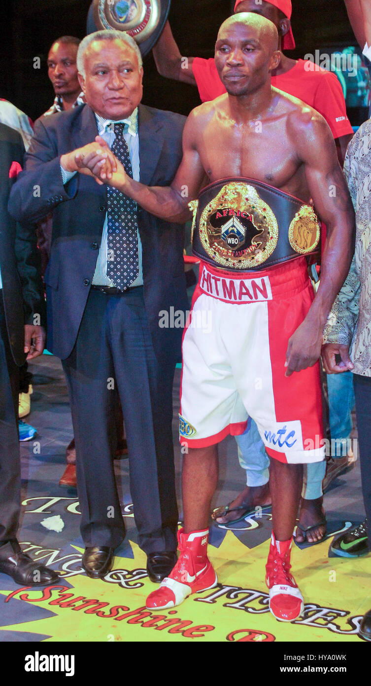 Windhoek. 1st Apr, 2017. World Boxing Organization (WBO) Africa Supervisor Captain Samir (L) shakes hands with Namibian boxer Paulus 'Hitman' Moses in Windhoek, capital of Namibia on April 1, 2017. Paulus 'Hitman' Moses on Saturday retained his World Boxing Organization (WBO) Africa Lightweight Title with a seventh round knockout (KO) of replacement boxer Chrispine Moliati from Malawi. The Namibian now has a record of 42 fights 39 wins and three losses. Credit: Nampa/Xinhua/Alamy Live News Stock Photo