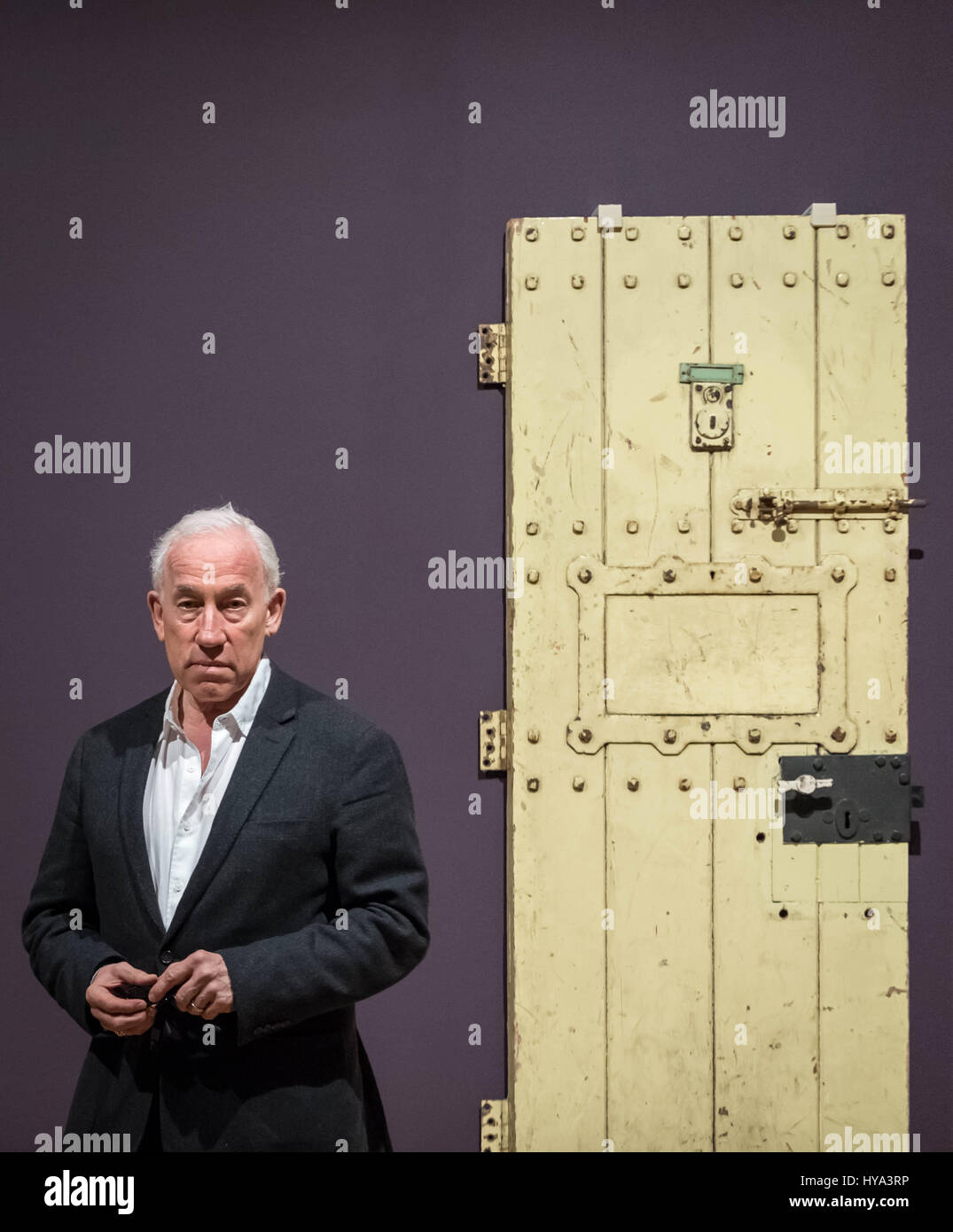 London, UK. 3rd April, 2017. Actor Simon Callow with the door from Oscar Wilde’s prison cell in Reading jail. Tate Britain opens first ever exhibition dedicated to Queer British art. Queer British Art 1861-1967 marks the 50th anniversary of partial decriminalisation of male homosexuality in England and Wales © Guy Corbishley/Alamy Live News Stock Photo