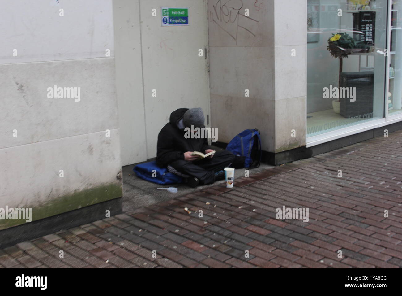 Images taken Saturday 1st April 2017 of homeless people in Belfast city centre. their were a lot more around but i chose 3 to start with.Saturday was very mild weather wise for a change with the start of spring.I am back at college studying and this is a topic    i have started in relation to coursework I believe this is a subject that needs more attention,More funding and less judgement. My dad always said the only time you should look down at someone is when you are helping them up. Stock Photo
