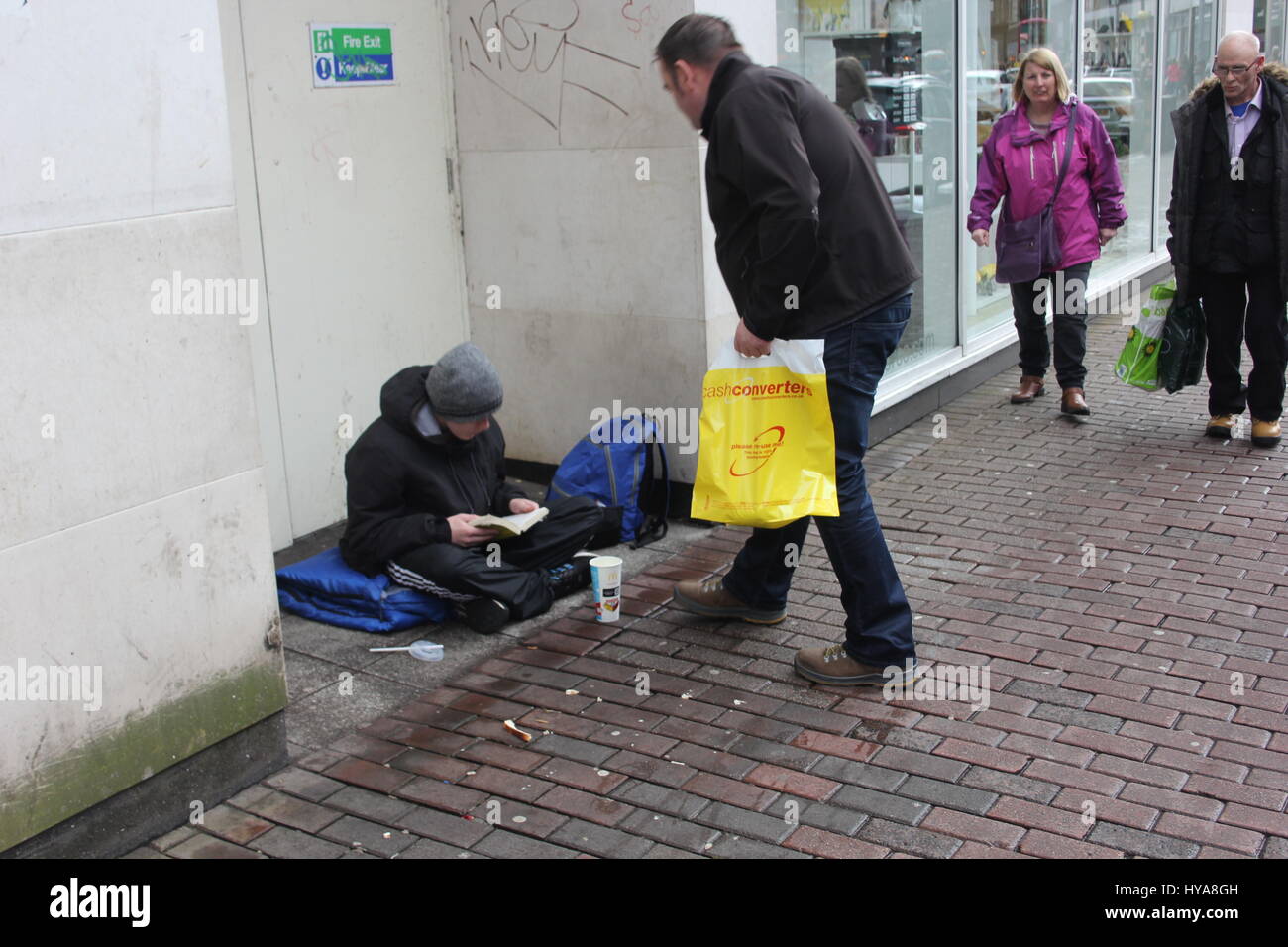 Images were taken Saturday 1st April 2017 of homeless people in Belfast city centre. their were a lot more around but i chose 3 to start with.Saturday was very mild weather wise for a change with the start of spring.I am back at college studying and this is a topic    i have started in relation to coursework I believe this is a subject that needs more attention,More funding and less judgement. My dad always said the only time you should look down at someone is when you are helping them up. Stock Photo
