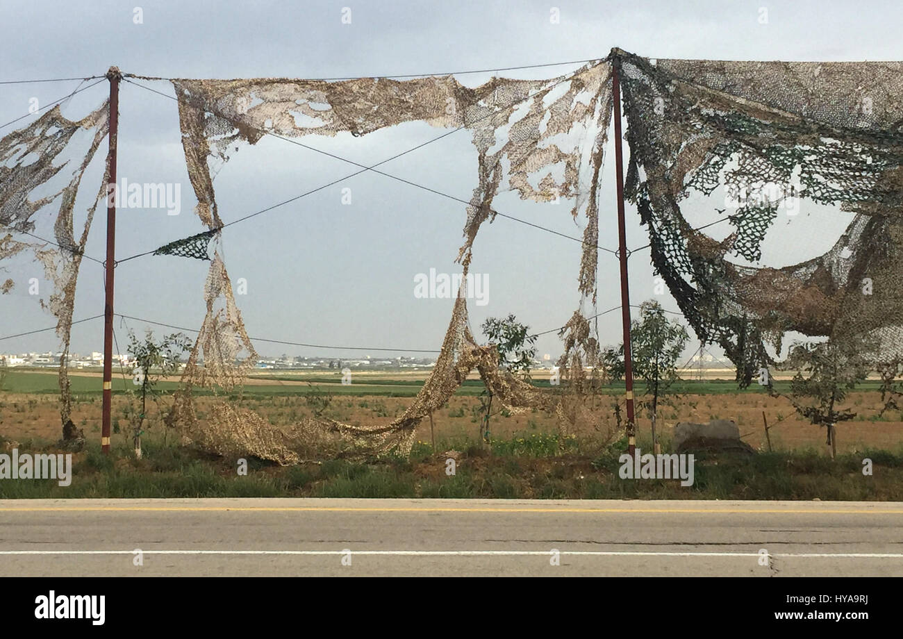 View of the Gaza border between ripped camouflage nets in Israel, 30 ...