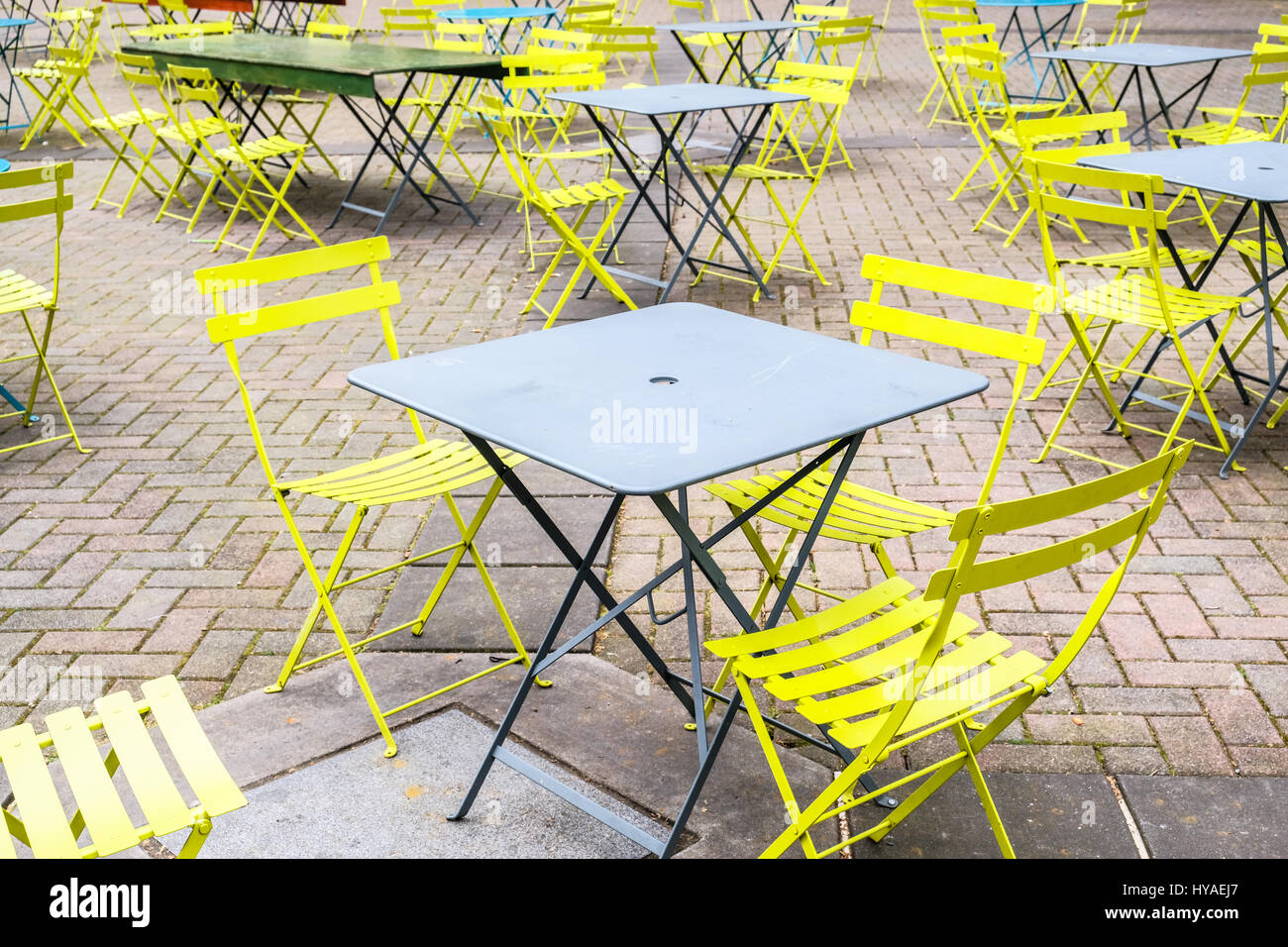 Close Up View Of Empty Folding Tables And Neon Green Folding