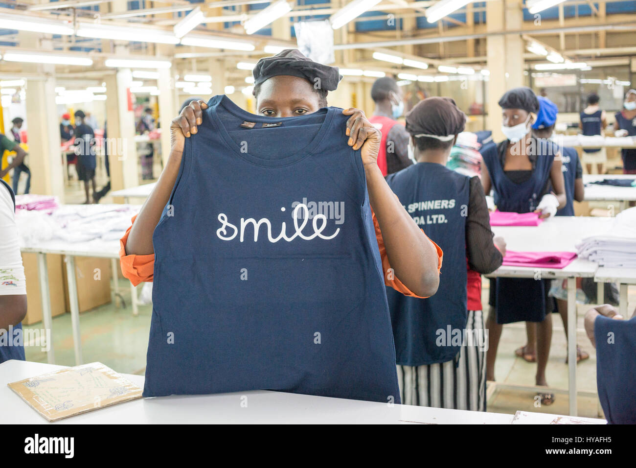 Textile workers producing clothing at a factory in Kampala, Uganda, owned  by Fine Spinners Uganda Ltd, using cotton grown in Africa Stock Photo -  Alamy
