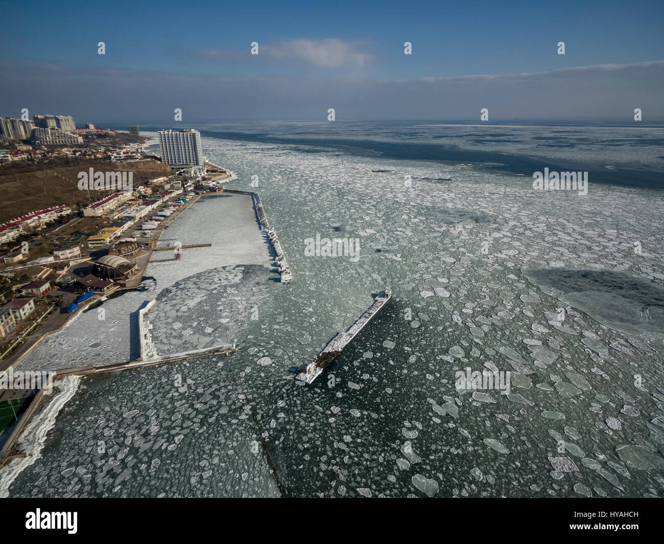 Aerial drone image of the Black Sea frozen at 12 Station Beach in Odessa Ukraine. Stock Photo