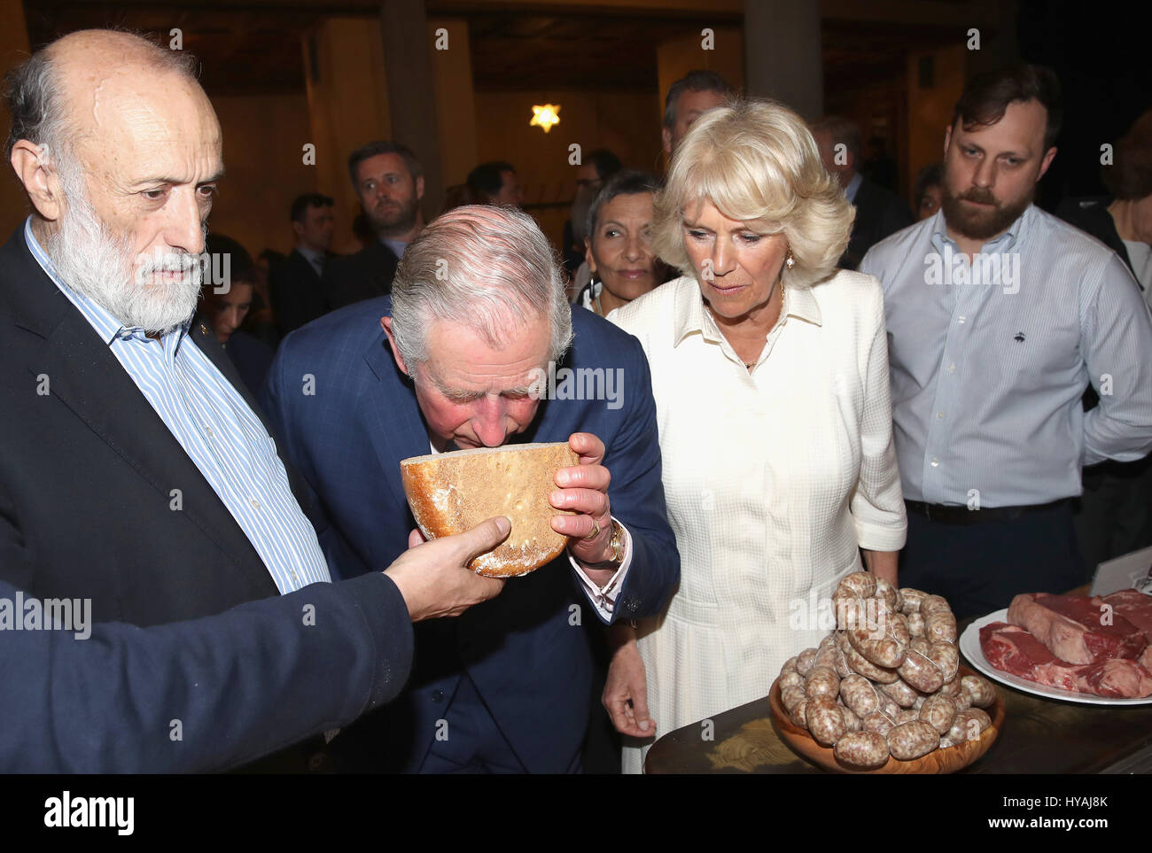 The Prince of Wales and the Duchess of Cornwall as they visit Sant'Ambrogio Market to celebrate the Slow Food movement and meet local food producers of the Abruzzo region and areas affected by the Italian earthquakes of 2016, on the sixth day of his nine-day European tour. Stock Photo