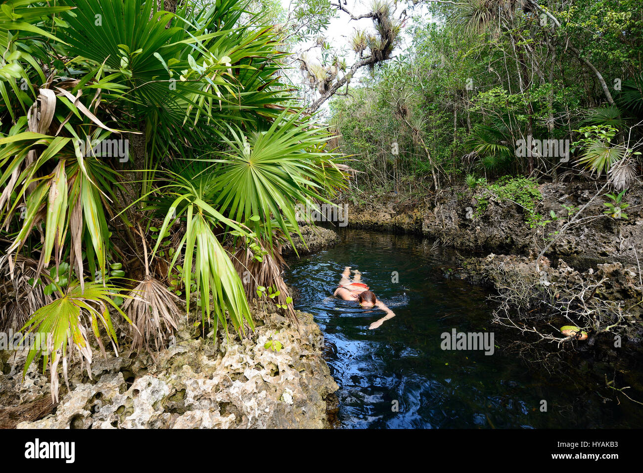 Diving tourist in Cueva de los Peces it is a 70m-deep cenote on the south coast of Cuba  near Giron beach Stock Photo