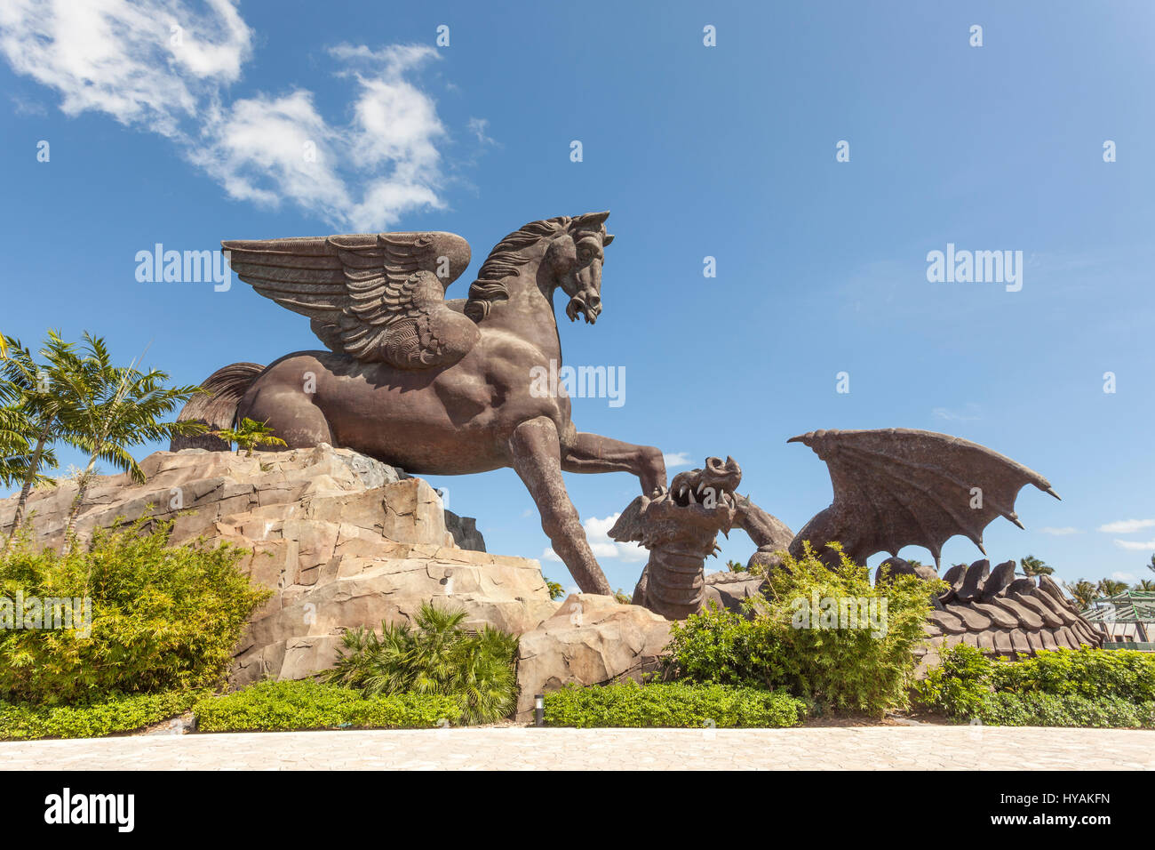 HALLANDALE BEACH, USA - MAR 11, 2017: Statue of Pegasus defeating a dragon in Gulfstream Park. Hallandale Beach, Florida, United States Stock Photo