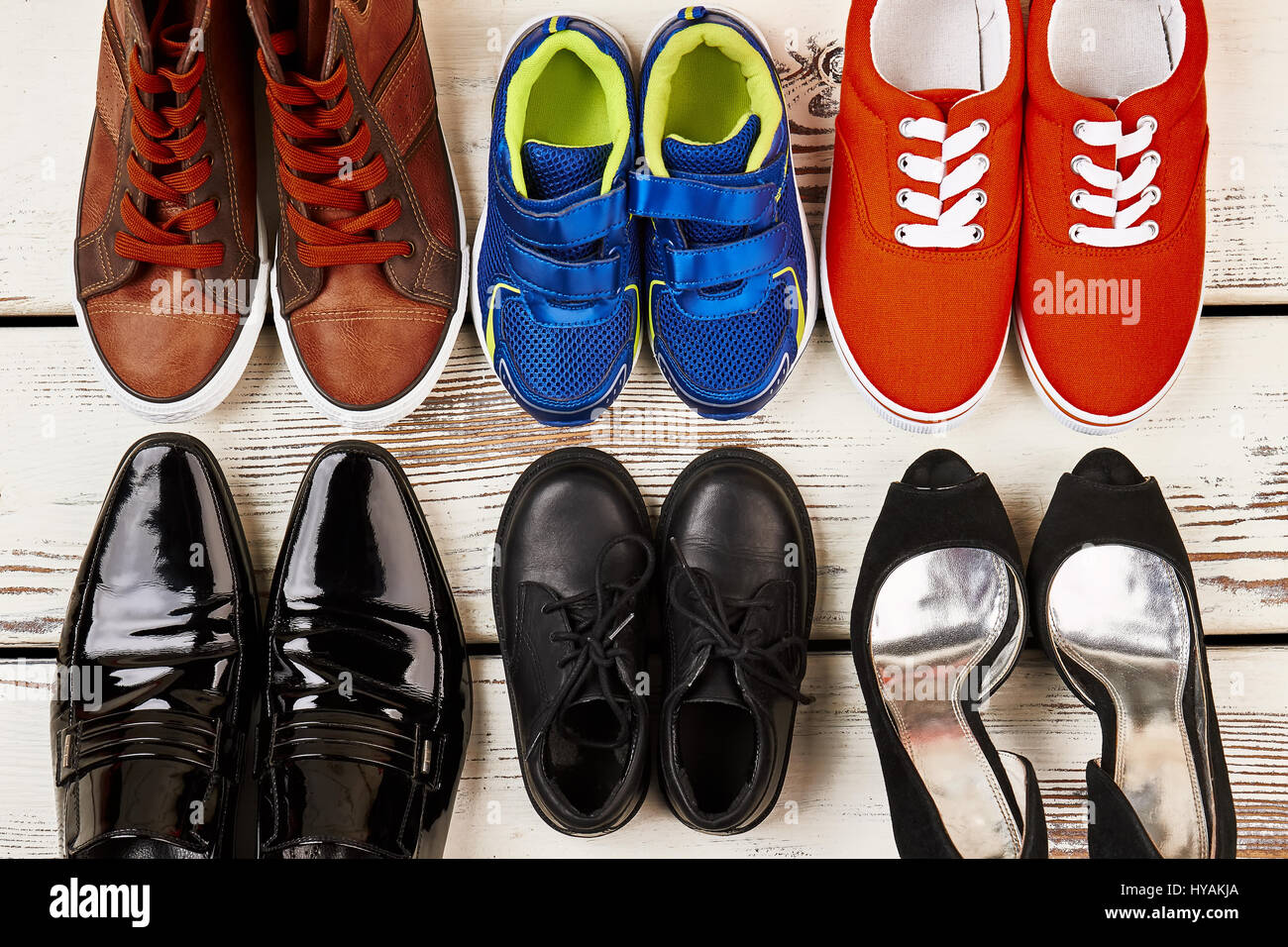 Formal shoes and sneakers Stock Photo Alamy