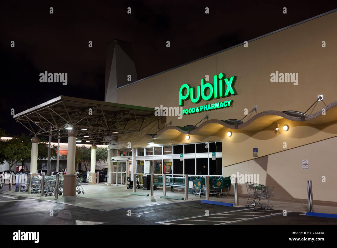 Miami, FL, USA - March 12, 2017: Publix food and pharmacy grocery store illuminated at night. Miami, Florida, United States Stock Photo