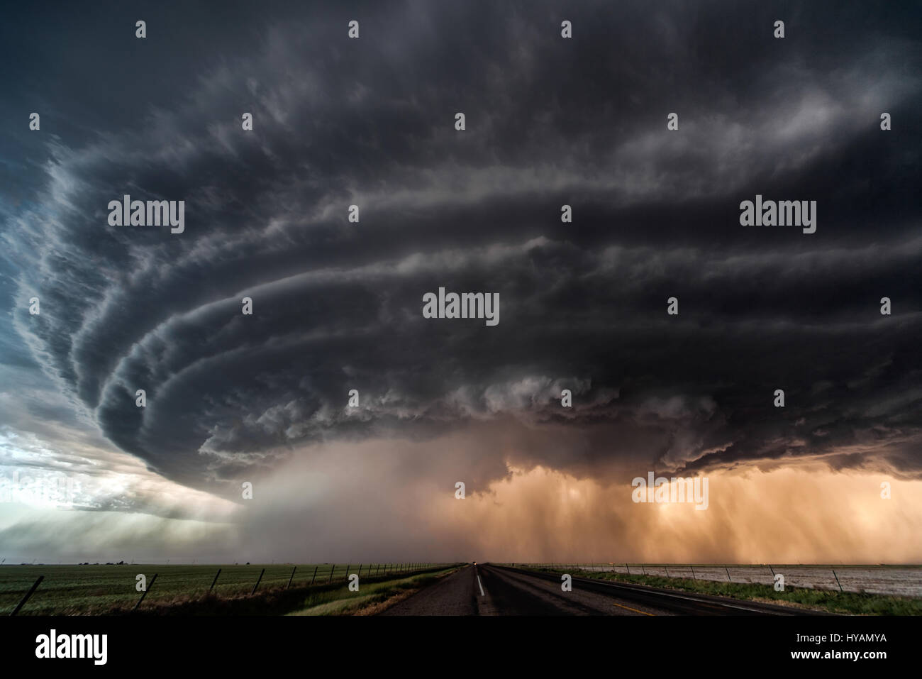 OKLAHOMA, USA: MEET THE female elementary teacher who was inspired by Hollywood film “Twister” and now risks her life to bring you these extraordinary photos of supercell thunderstorms and tornados. Pictures show how the 31-year-old Valentina Abinanti from Galliate, Italy battles winds of over 100-miles-per-hour, over her decade long stormchasing career, which has seen her encounter 70 tornados and four hundred storms. On May 31st 2013, Valentina even survived one deadly tornado, El Reno, the widest in recorded history, which killed three fellow stormchasers and is remembered by the community Stock Photo