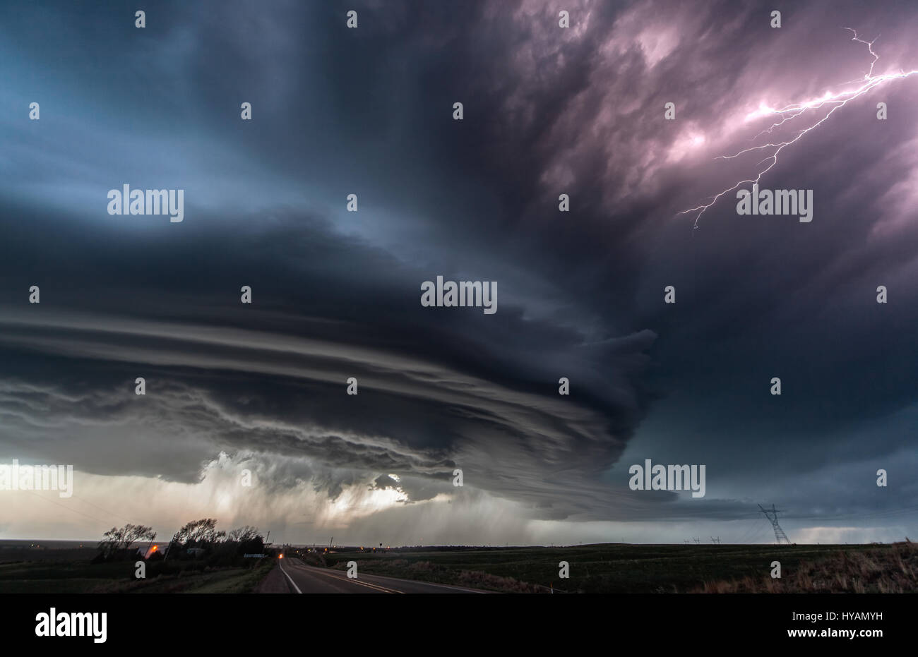 OKLAHOMA, USA: MEET THE female elementary teacher who was inspired by Hollywood film “Twister” and now risks her life to bring you these extraordinary photos of supercell thunderstorms and tornados. Pictures show how the 31-year-old Valentina Abinanti from Galliate, Italy battles winds of over 100-miles-per-hour, over her decade long stormchasing career, which has seen her encounter 70 tornados and four hundred storms. On May 31st 2013, Valentina even survived one deadly tornado, El Reno, the widest in recorded history, which killed three fellow stormchasers and is remembered by the community Stock Photo