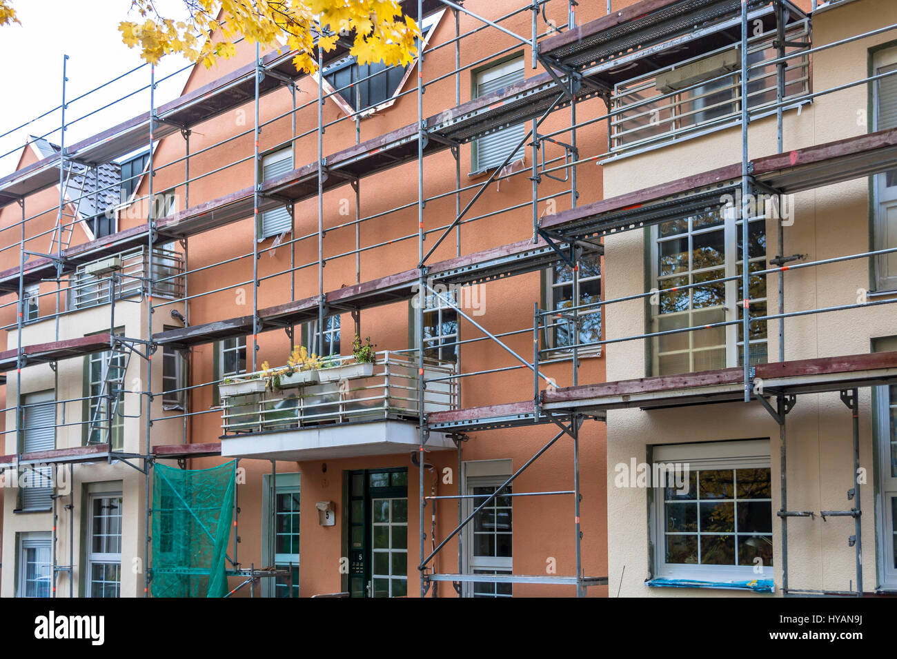 Europe, Germany, North Rhine-Westphalia, scaffold on a residential house in the city of Wetter on the river Ruhr. Stock Photo
