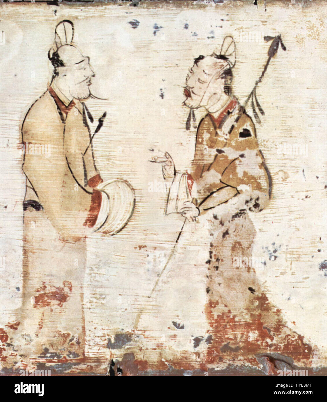 This ancient artwork attributed to a Chinese painter from the 3rd century BC captures the artistic styles and cultural significance of early Chinese painting. The piece reflects the classical themes of Chinese art during the Warring States period. Stock Photo