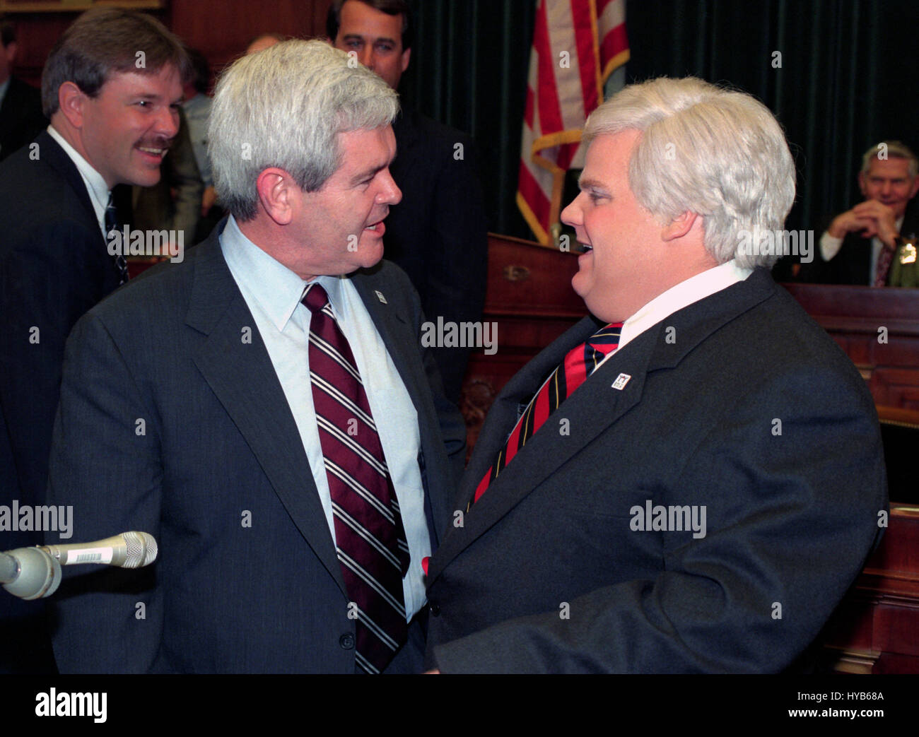 U.S House Speaker Newt Gingrich, left, meets comedian Chris Farley who impersonates Gingrich on the television show Saturday Night Live during an even on Capitol Hill April 4, 1995 in Washington, DC. Stock Photo