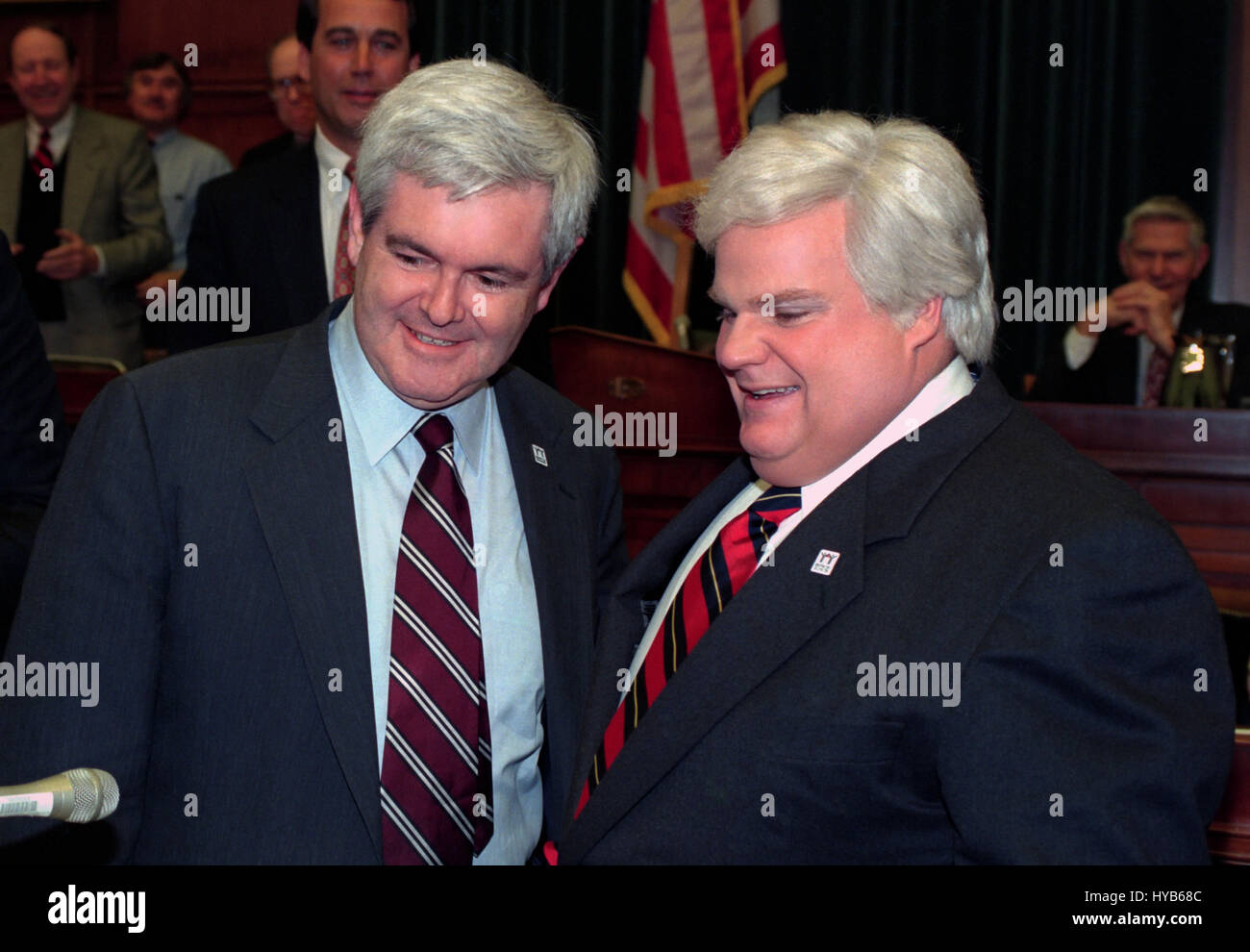 U.S House Speaker Newt Gingrich, left, meets comedian Chris Farley who impersonates Gingrich on the television show Saturday Night Live during an even on Capitol Hill April 4, 1995 in Washington, DC. Stock Photo