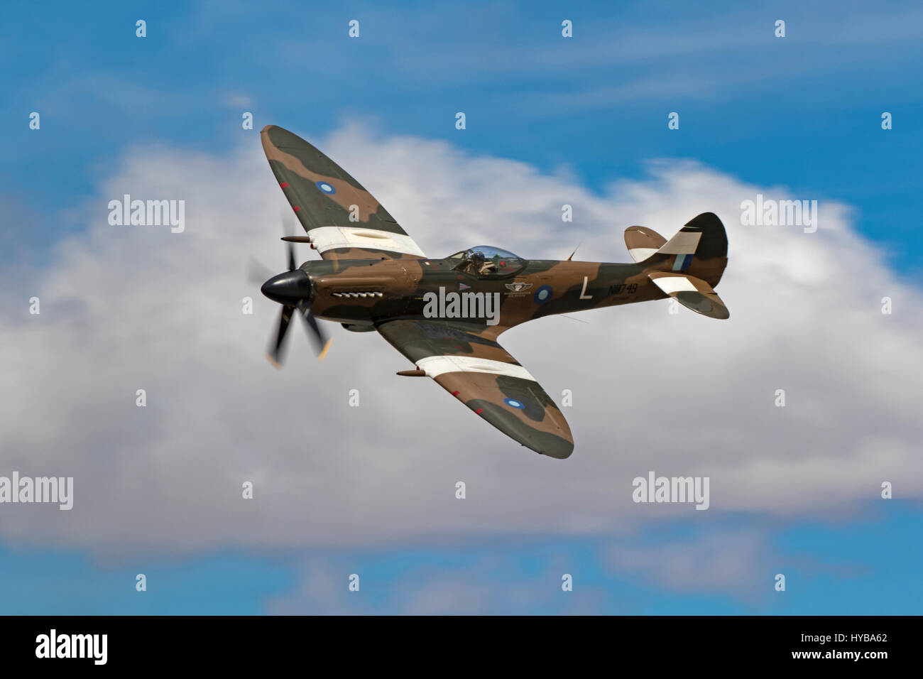 Airplane Submarine Spitfire WWII vintage aircraft flying at air show Stock Photo