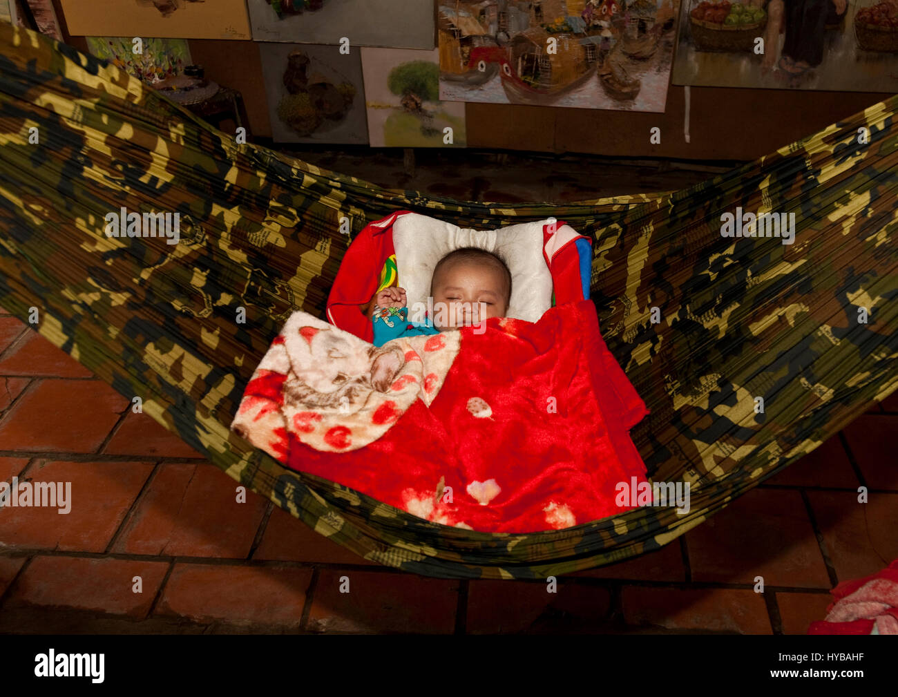 Baby sleeping in hammock at Sadec Stock Photo Alamy