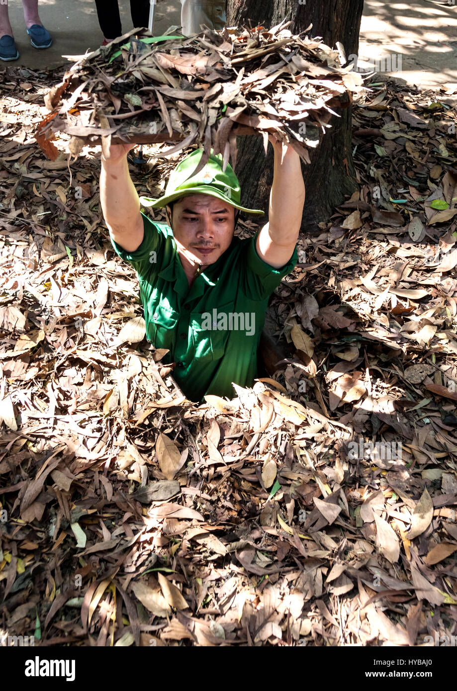 camouflaged cover hides the entrance to this Viietcong tunnel at  Cu Chi Stock Photo