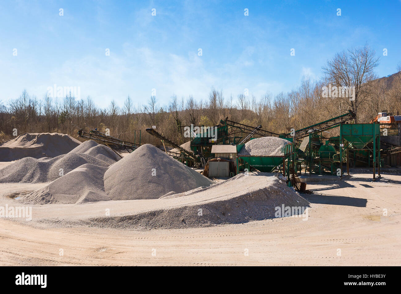 Extraction gravel. Machinery distribution and classification by size gravel. Conveyors for transporting gravel.Gravel quarry. Construction industry. Stock Photo