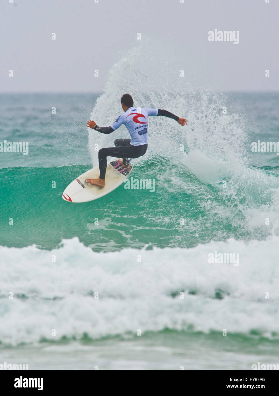 Surfer cutting the wave Stock Photo - Alamy