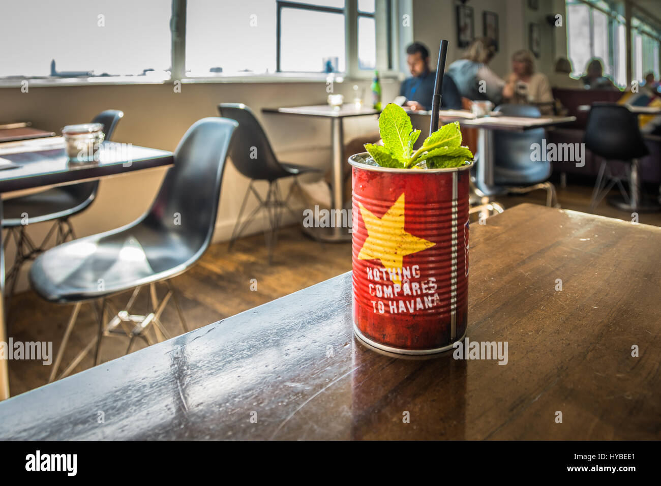 A Havana Club cocktail in a tin can on a table Stock Photo