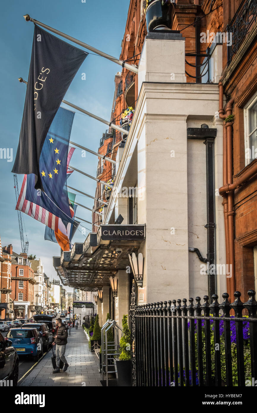 Flags outside the entrance to Claridges Hotel in Mayfair, London, England, UK Stock Photo