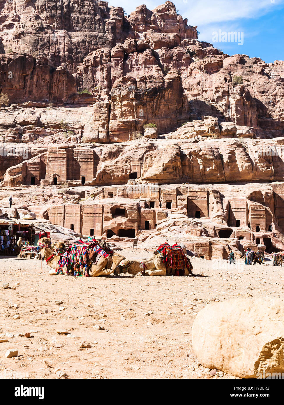 PETRA, JORDAN - FEBRUARY 21, 2012: bedouin camels in ancient Petra town. Rock-cut town Petra was established about 312 BC as the capital city of the A Stock Photo