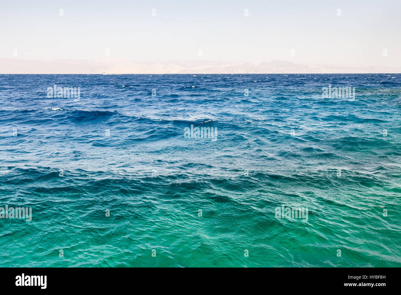 Travel to Middle East country Kingdom of Jordan - water surface of Gulf of Aqaba on Red Sea in winter morning Stock Photo