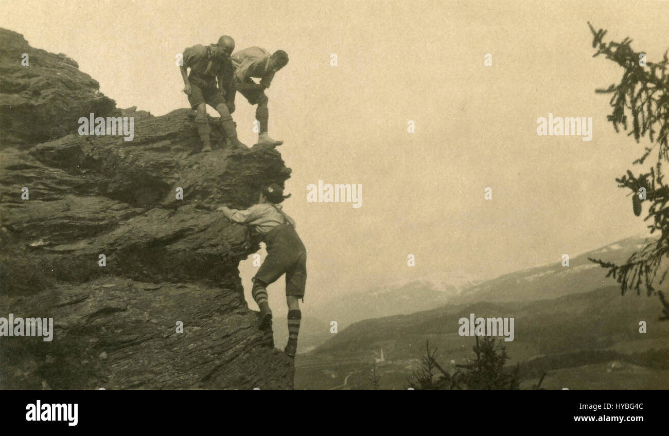 Three men climbing the Lansen Kopf, Austria Stock Photo