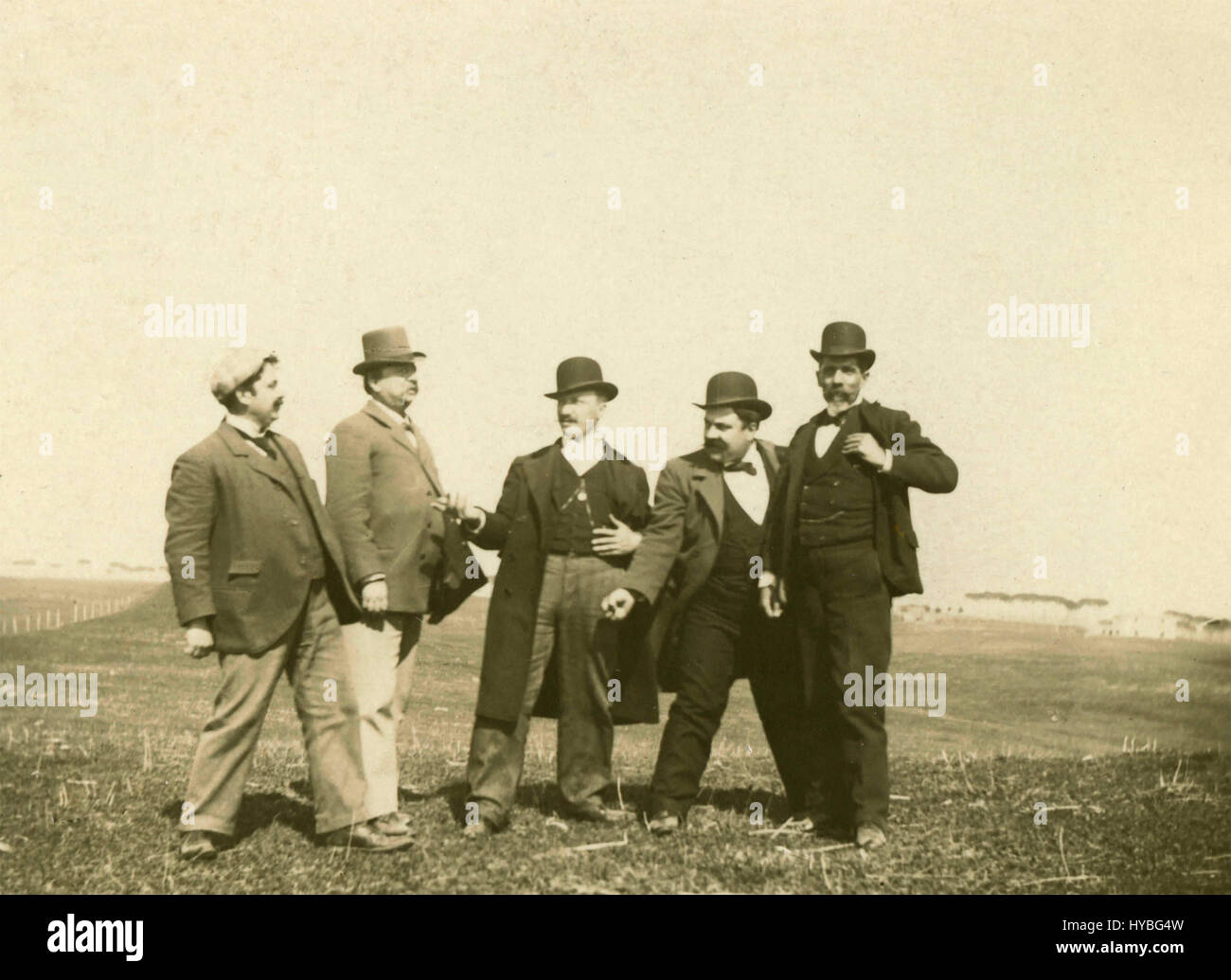 Five men in a field Stock Photo