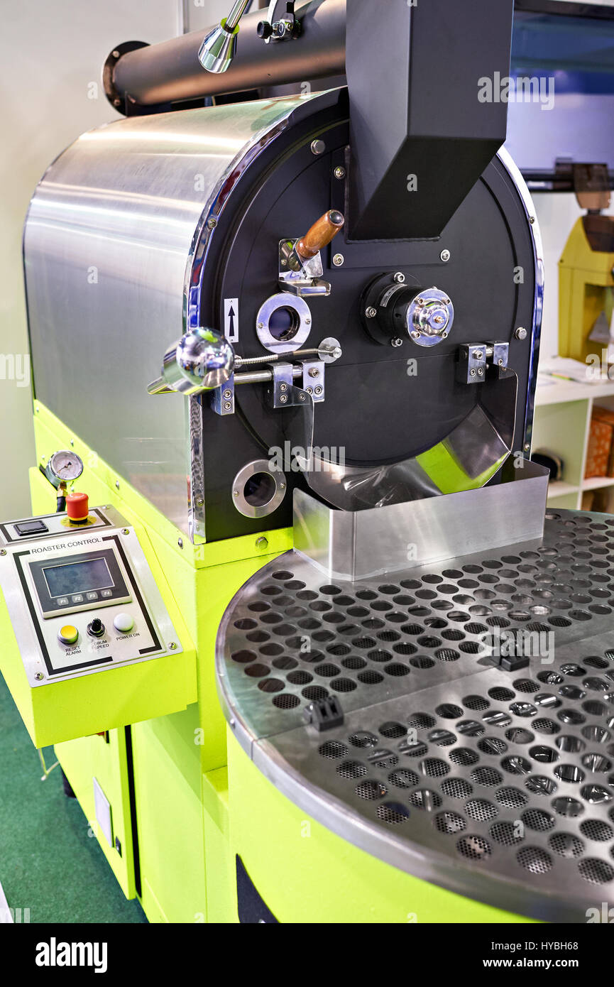 Commercial drum type coffee roaster closeup Stock Photo Alamy