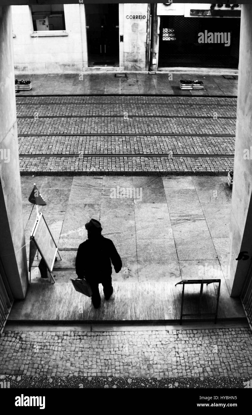 Someone getting out of a shopping mall in Brito Capelo street in the centre of Matosinhos, Porto, Portugal. Stock Photo