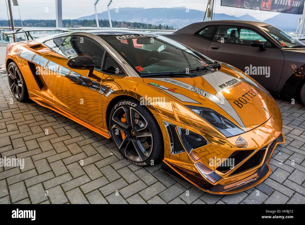 Gold sports car outside Vancouver Auto Show, Vancouver, British Columbia, Canada. Stock Photo