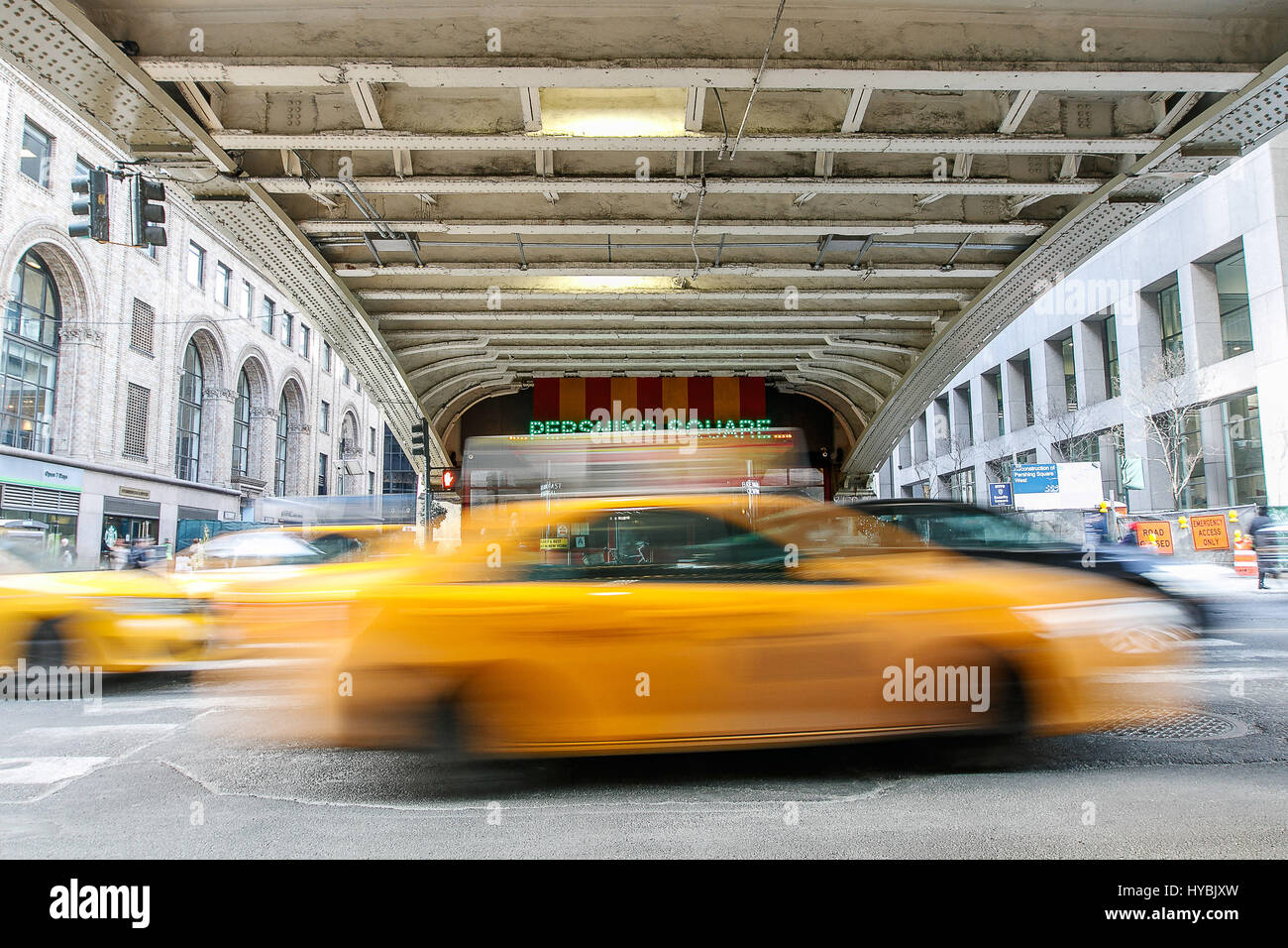 Blurred view of taxis moving along the 42nd street at Pershing Square. Stock Photo