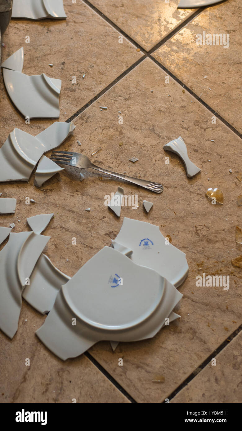 close up on broken dishes on the floor Stock Photo Alamy