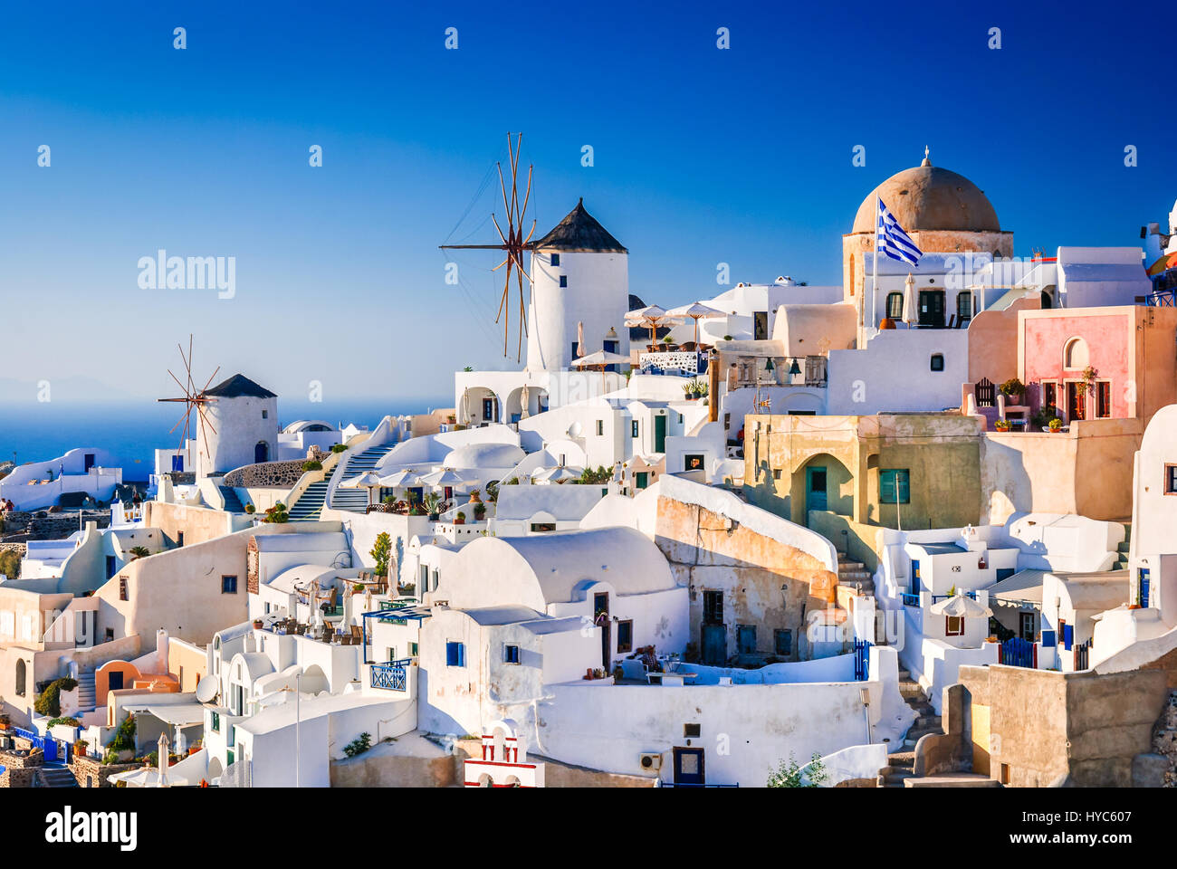 Santorini, Greece. Oia city with white and blue houses in Aegean Sea. Thira, Cyclades Islands. Stock Photo