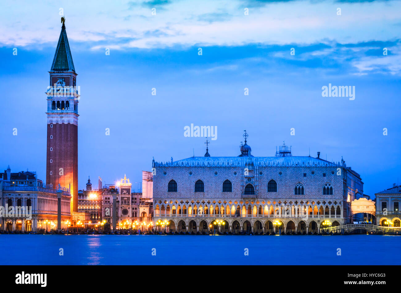 Venice, Italy - Campanile di San Marco and Palazzo Ducale (Doge's Palace) in Venezia, night scene of italian landmark. Stock Photo