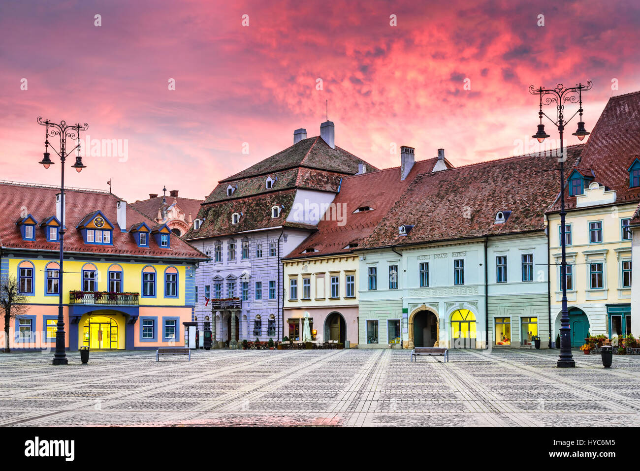 Sibiu, Romania. Colorful clouds on sunrise, Large Square in Sibiu, Transylvania. Stock Photo