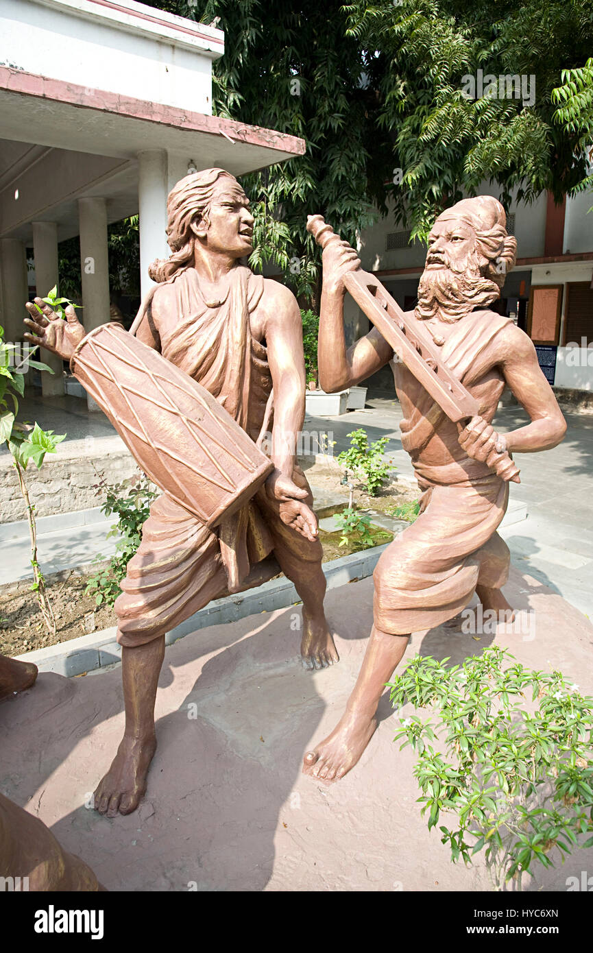 sculpture playing musical instruments, varanasi, uttar pradesh, Asia, India Stock Photo