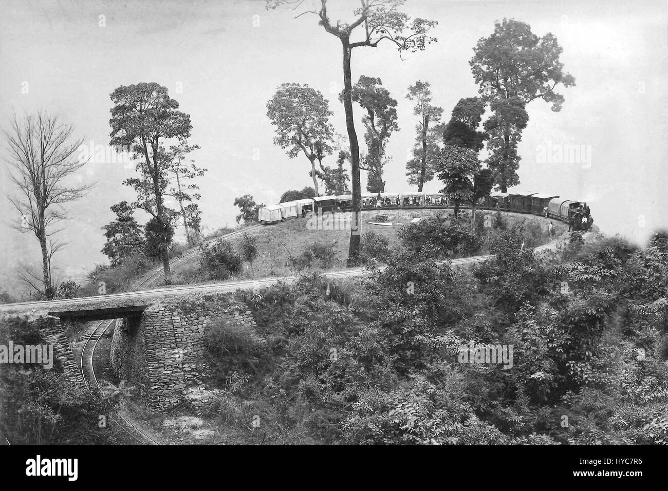 Darjeeling Himalayan Railway, DHR, Toy train, Batasia Loop, Darjeeling, Ghum, Ghoom, New Jalpaiguri, West Bengal, India, Asia, old vintage 1900s picture Stock Photo