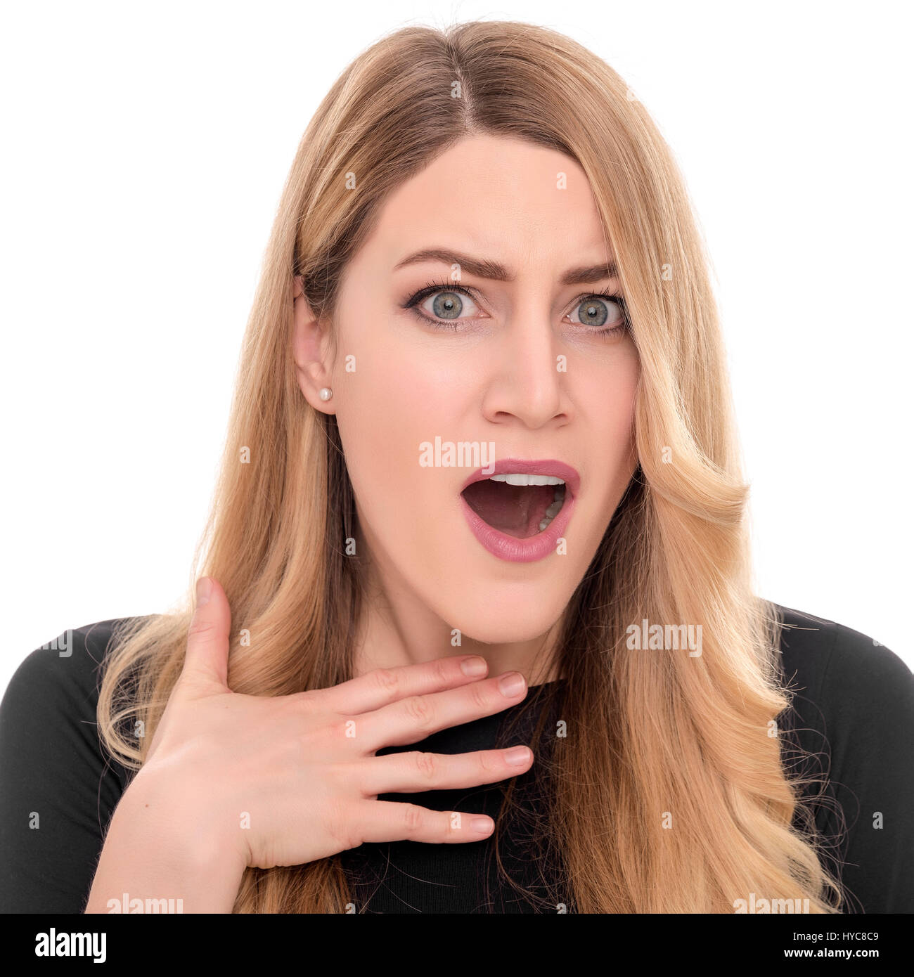Surprised pretty young woman Stock Photo - Alamy