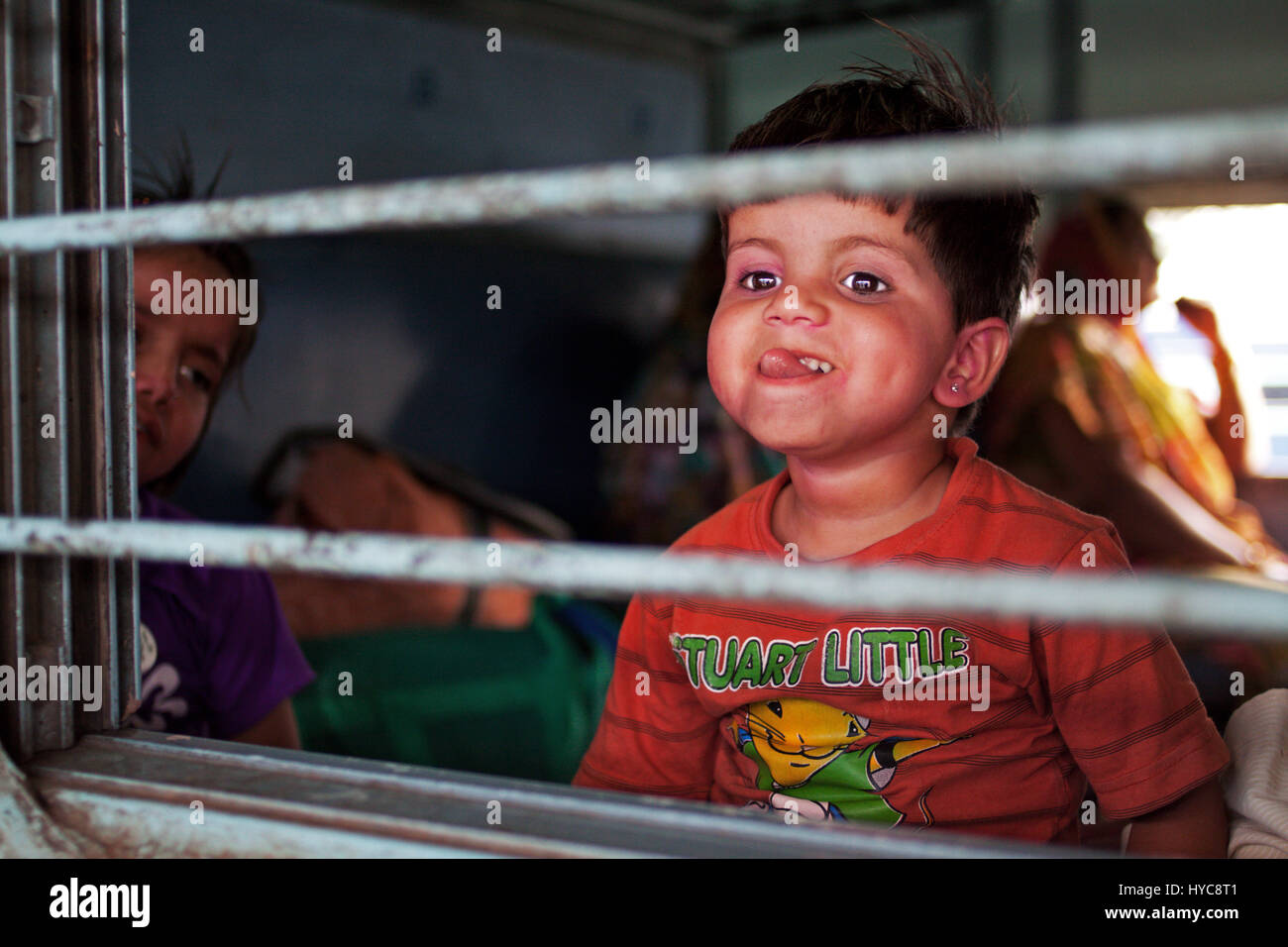 child from window train, agra, uttar pradesh, Asia, India Stock Photo