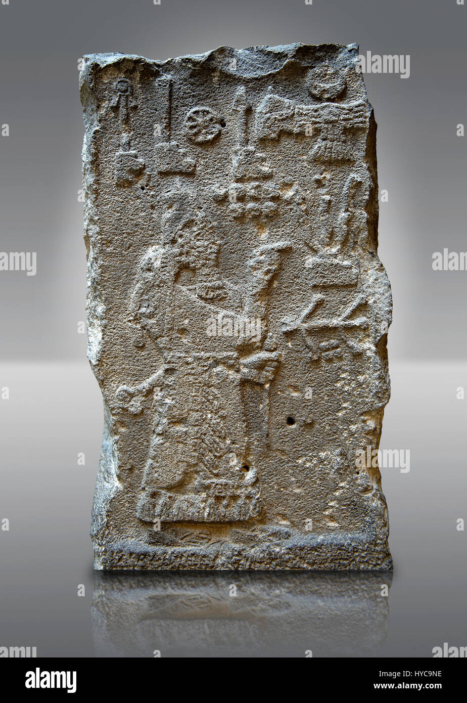 810-783 B.C Neo-Assyrian Stele with relief sculpture & inscription to King Adad-Nirari III (son of Samsi-Adad V, King of Assyria) praying to the gods. Stock Photo