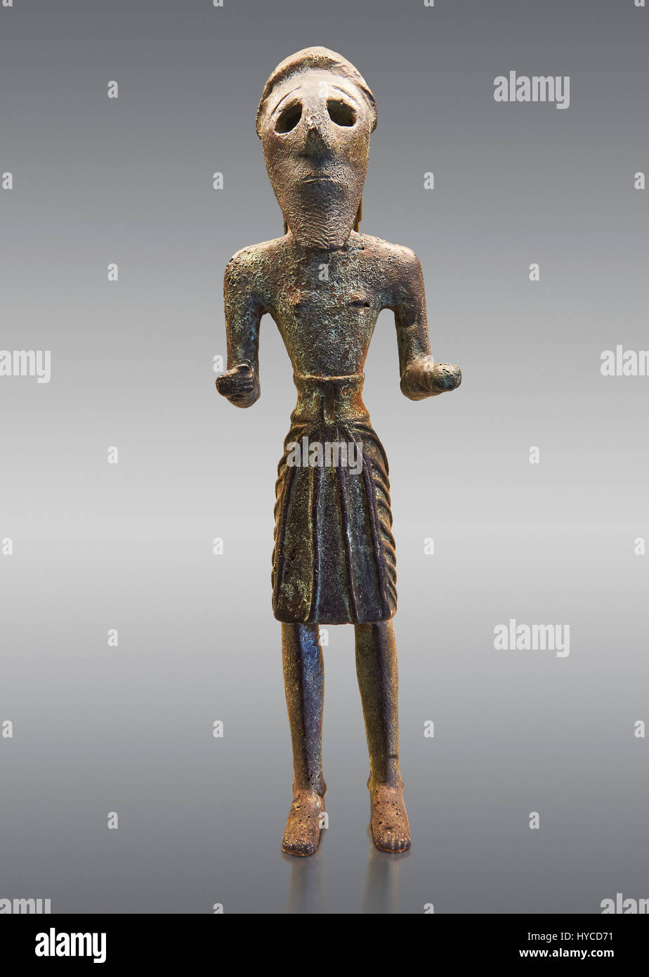 Copper statuettes of warriors with a short loincloth which originally held weapons in their hands, as well as representation of a woman. These acquire Stock Photo