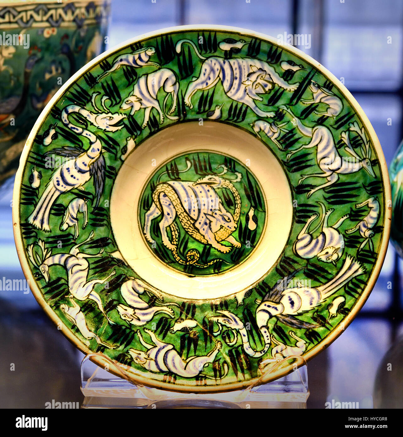 Dish decorated with real and fantastic creatures including a Simurgh ( Iranian mythical bird ) Iznik Ottoman dynasty 1560-1565  (circa)  Asia,Turkey, Marmara Region,Bursa (province),Iznik Stock Photo