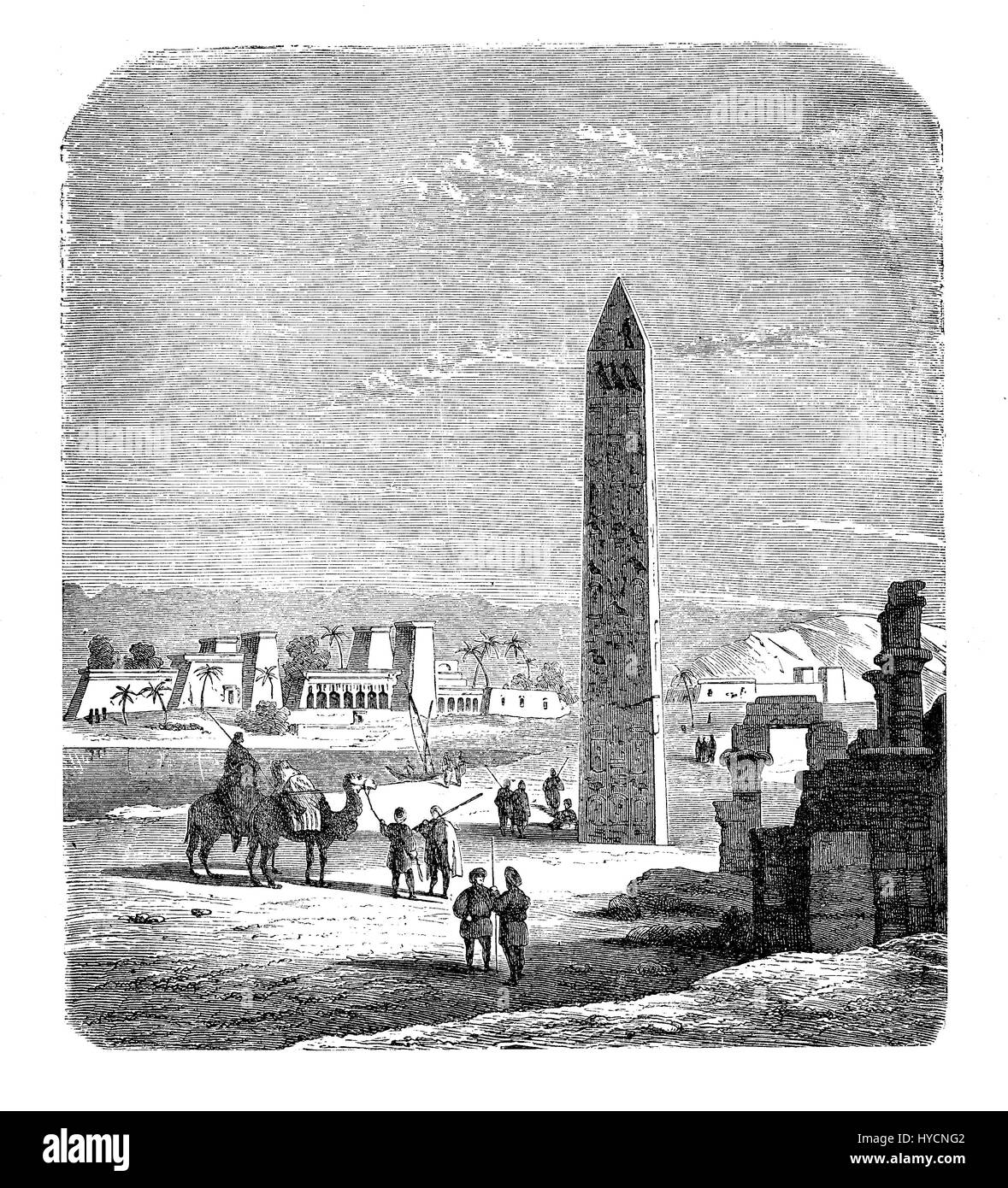 XIX century engraving describing in a romantic view of way of life and costumes in Egypt: people traveling on camels in the desert with the view of an obelisk, antique temples and ruins Stock Photo