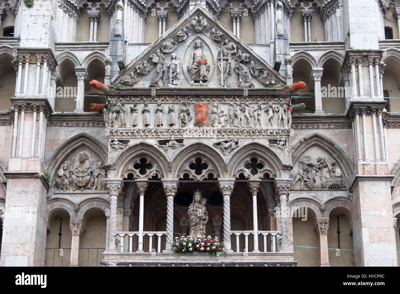 Detail of a late Gothic facade of the cathedral of Ferrara, Italy Stock Photo