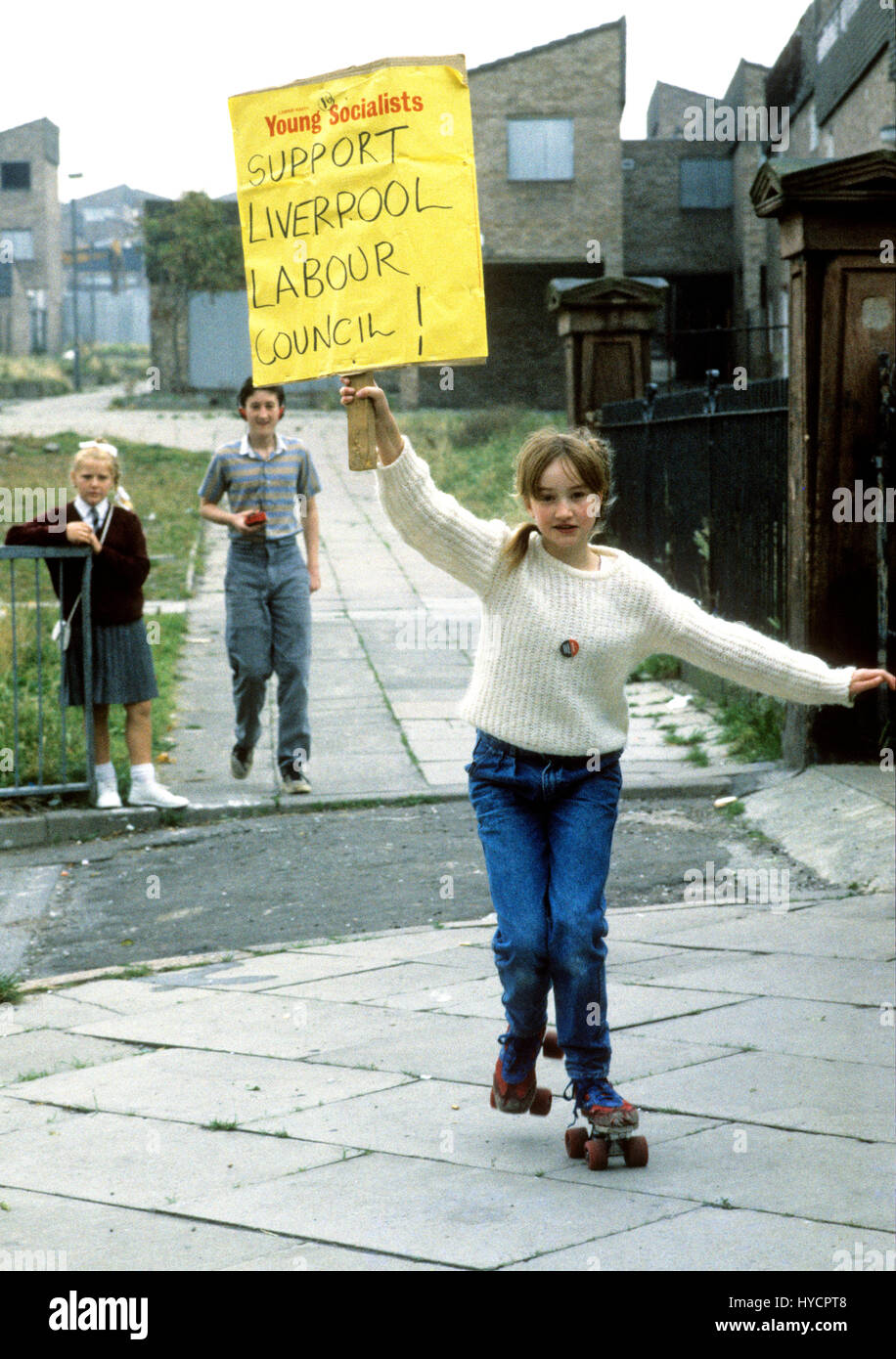 Young socialist waving banner supporting the Militant led Liverpool Council in 1985 Stock Photo