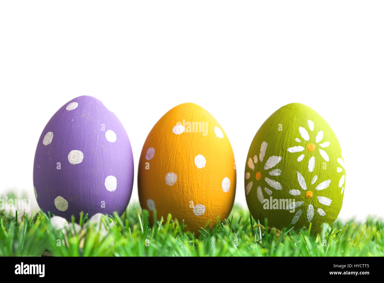 Bunch of easter eggs in pastel colors on grass Stock Photo