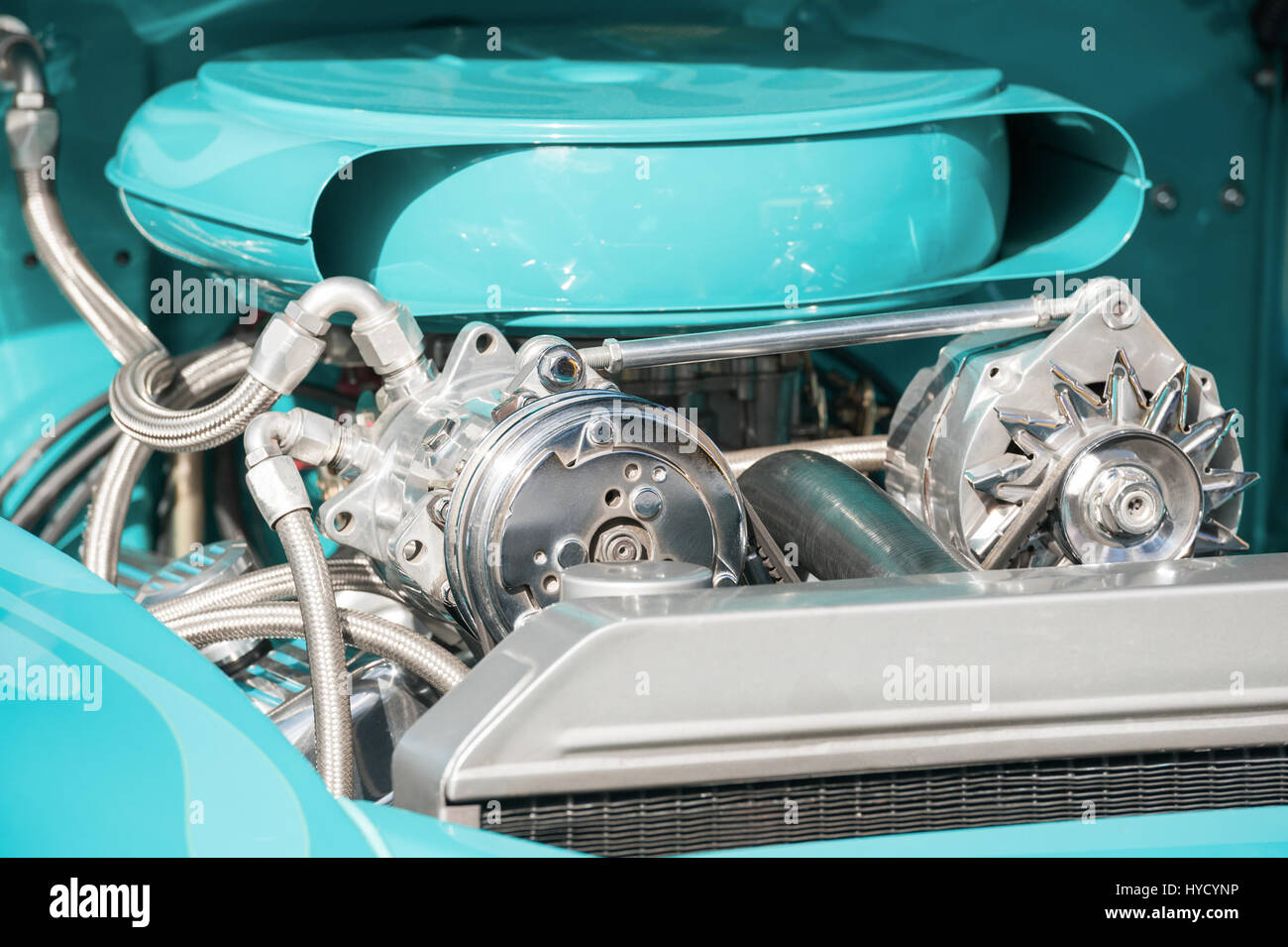 chrome and turquoise engine bay on a high performance vehicle Stock Photo -  Alamy